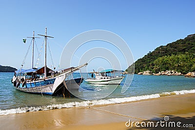 Ilha Grande: Sailboat at coastline near Praia Lopes Mendes, Rio de Janeiro state, Brazil Stock Photo