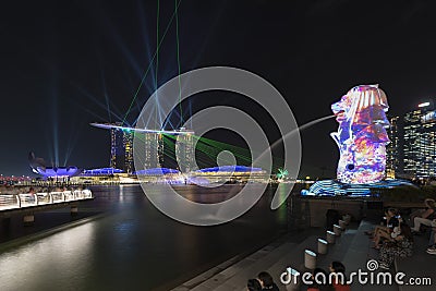 Singapore, Singapore - March 14, 2018: iLight Marina Bay and Light show on Marina Bay Sands, Singapore Editorial Stock Photo