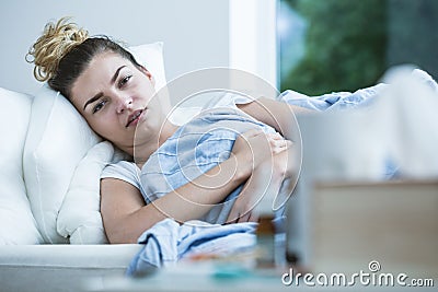 Ill girl in bed Stock Photo