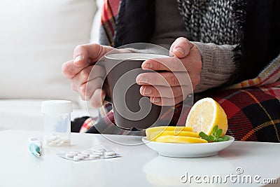 Ill man and hot drink Stock Photo