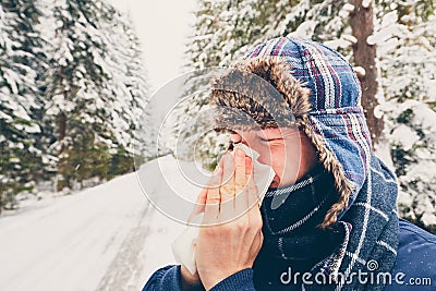 Ill man in winter nature Stock Photo