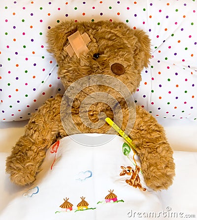 Ill teddy bear Stock Photo