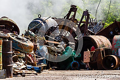 Illegal garbage dump. Large pile of metal waste. The concept of ecology pollution Stock Photo
