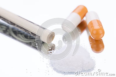 Illegal pharmaceutical pills and drugs money Stock Photo