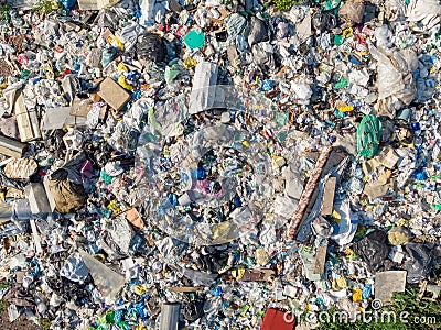 Illegal storage of solid household waste, plastic bottles and garbage bags. Land pollution Aerial top view Stock Photo