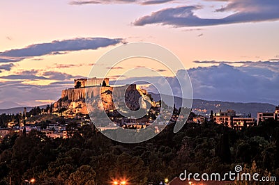 Illuminated Acropolis in Athens, Greece at dusk Stock Photo