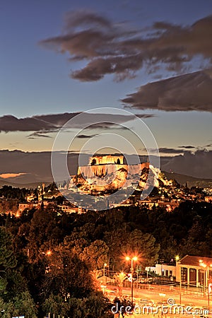Illuminated Acropolis in Athens, Greece at dusk Stock Photo