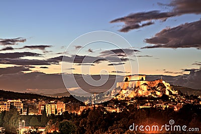 Illuminated Acropolis in Athens, Greece at dusk Stock Photo