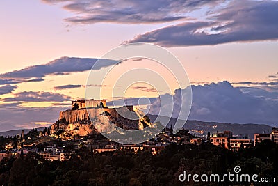 Illuminated Acropolis in Athens, Greece at dusk Stock Photo