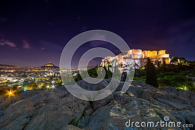 Illuminated Acropolis with Parthenon at night, Greece. Stock Photo