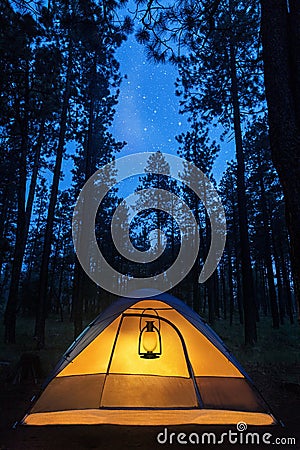 Illuminated Camping Tent Under Stars Stock Photo