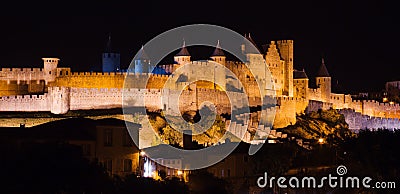 Illuminated Carcassonne castle at night Stock Photo