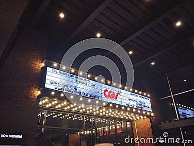 Illuminated CGV Cinema Marquee at Night Editorial Stock Photo