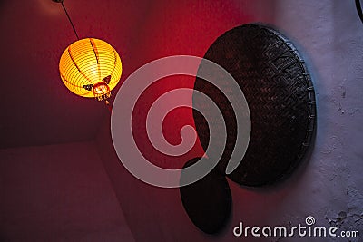 Illuminated Chinese lantern hanging from the ceiling Stock Photo