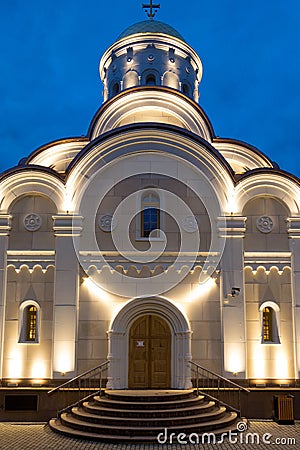 The illuminated church in the night, Norilsk Stock Photo