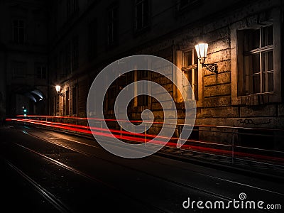 Illuminated cobbled street Stock Photo