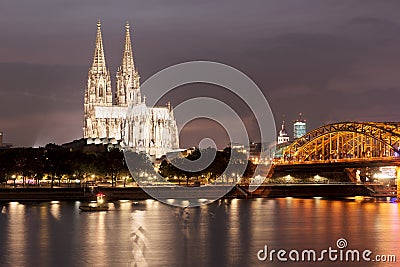 Illuminated Cologne Cathedral at night in Cologne Stock Photo