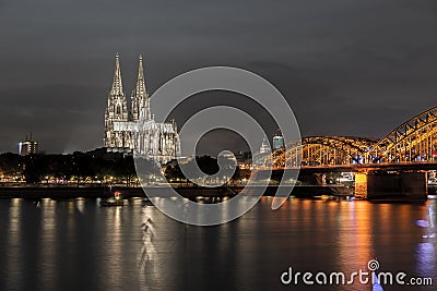 Illuminated Cologne Cathedral at night in Cologne Stock Photo