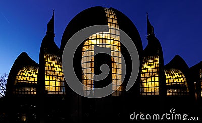 Illuminated cologne mosque at dusk Stock Photo