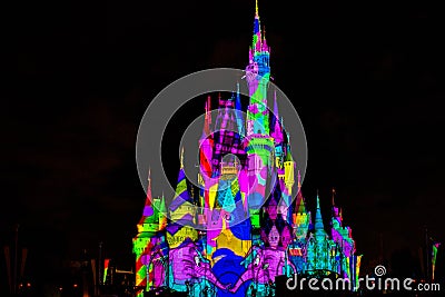 Illuminated and colorful Cinderella Castle in One Upon a Time Show at Magic Kingdom 4. Editorial Stock Photo