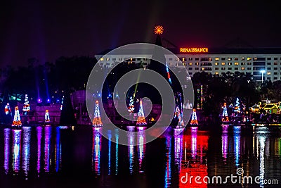 Illuminated and colorful Sea of Christmas Trees and partial view of Reinassance Hotel at Seaworld 3 Editorial Stock Photo