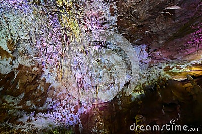 Illuminated Dripstones Inside Prometheus Cave Near Kutaisi, Georgia Stock Photo