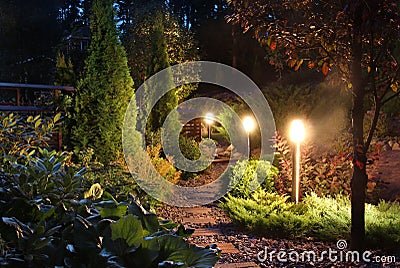 Illuminated garden path patio Stock Photo