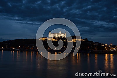 Illuminated gothic renaissance baroque medieval Bratislava castle Bratislavsky hrad fortress during blue hour Stock Photo