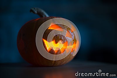 Illuminated halloween pumpkin on black background Stock Photo