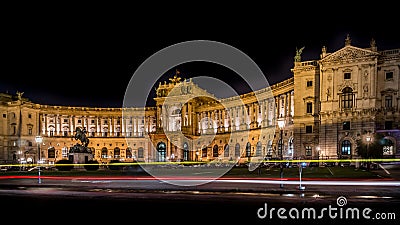 Illuminated Heldenplatz Heroes Sqaureat night with red yellow color light rail Editorial Stock Photo