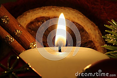 Illuminated holiday candle Stock Photo