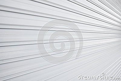 Illuminated metallic roller shutter door Stock Photo