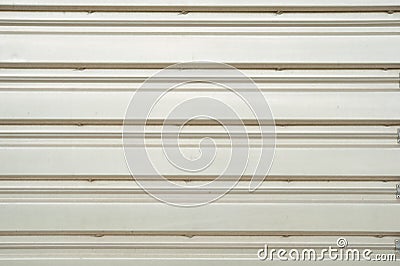 Illuminated metallic roller shutter door Stock Photo