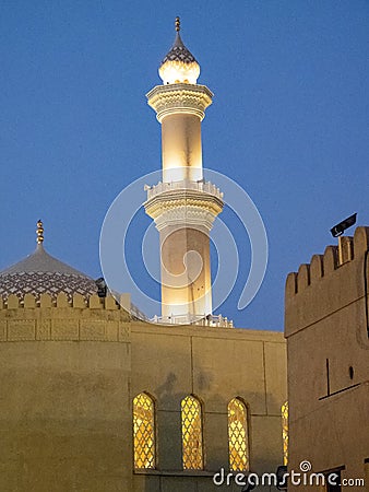 Illuminated minaret of the Great Mosque of Nizwa, Oman Stock Photo