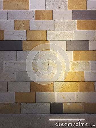 Illuminated multi colored tiled wall background Stock Photo