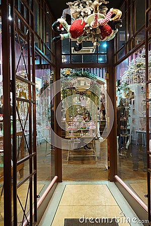 Illuminated Narrow Entrance to the Yorkshire Soap Company Shop in York. Editorial Stock Photo