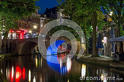 Illuminated Oudegracht canal in Utrecht, The Netherlands Editorial Stock Photo