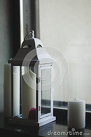 Illuminated outdoor lantern with candle Stock Photo