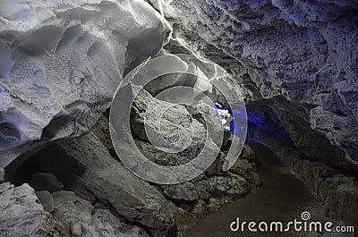 Illuminated passage in the Ice Cave in Kungur, Russia Stock Photo