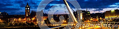 Illuminated Peace bridge in Derry Londonderry in Northern Ireland Editorial Stock Photo