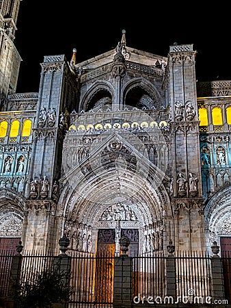 The illuminated Primate Cathedral of Saint Mary in Toledo at night, Spain Stock Photo