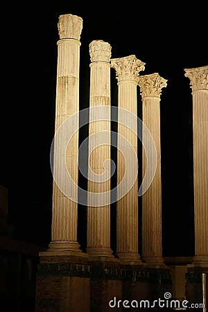 Illuminated roman temple at night Stock Photo