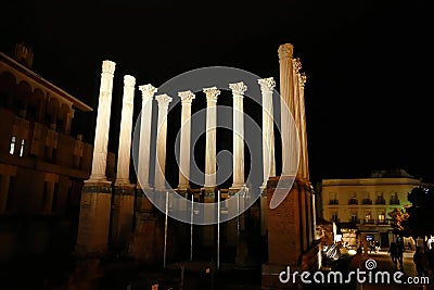 Illuminated roman temple at night Stock Photo