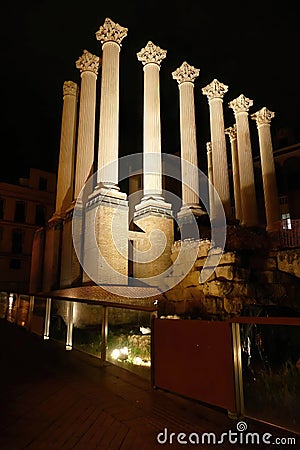 Illuminated roman temple at night Stock Photo