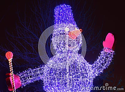 Illuminated snowman Stock Photo
