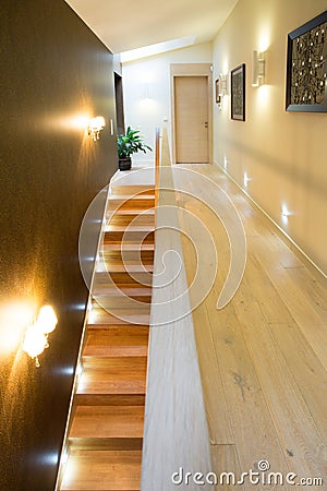 Illuminated stairs in luxury residence Stock Photo