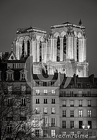 Illuminated towers of Notre Dame de Paris Cathedral at night Stock Photo