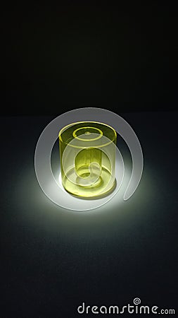 An illuminated transparant yellow tube Stock Photo