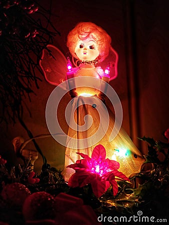 Illuminated vintage holiday seasonal Christmas Angel Stock Photo