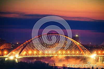 Illumination of Bugrinskiy bridge on the sunset Stock Photo